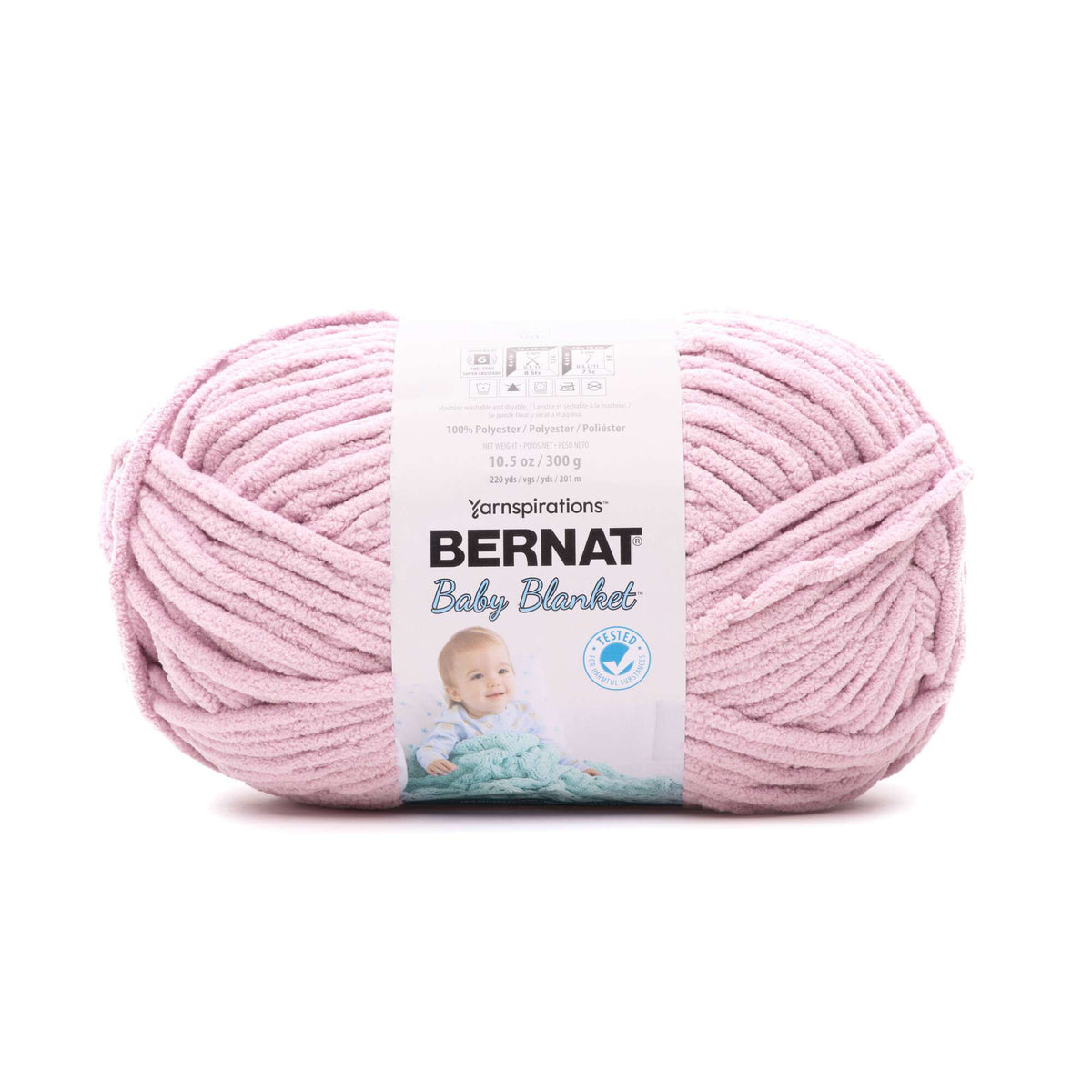Pink ball of yarn with Bernat Baby Blanket label on a white background