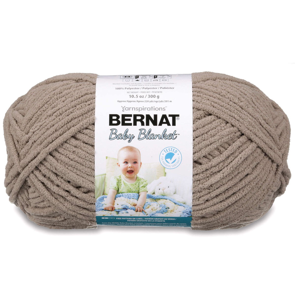 Ball of Bernat Baby Blanket yarn with a baby on the packaging on a white background