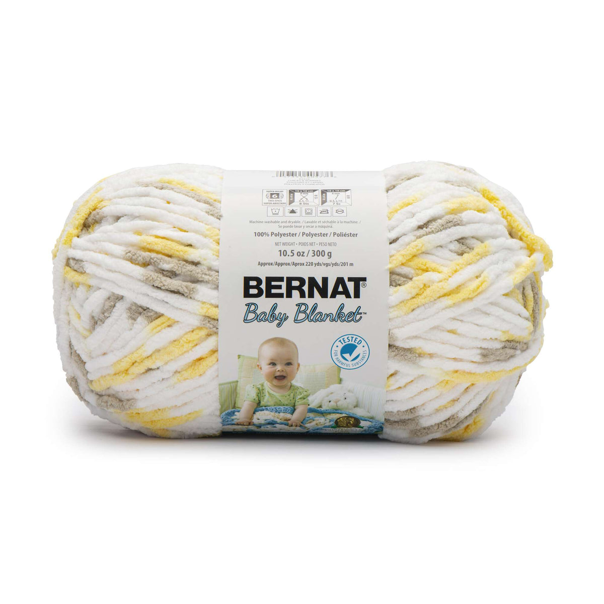 Ball of Bernat Baby Blanket yarn with a label featuring a baby on a white background