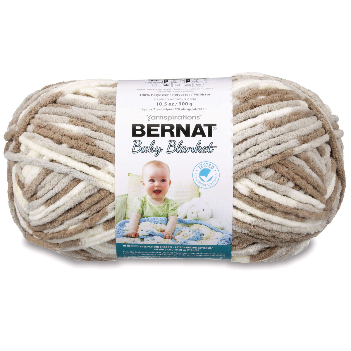 Ball of Bernat Baby Blanket yarn with a baby on the label against a white background