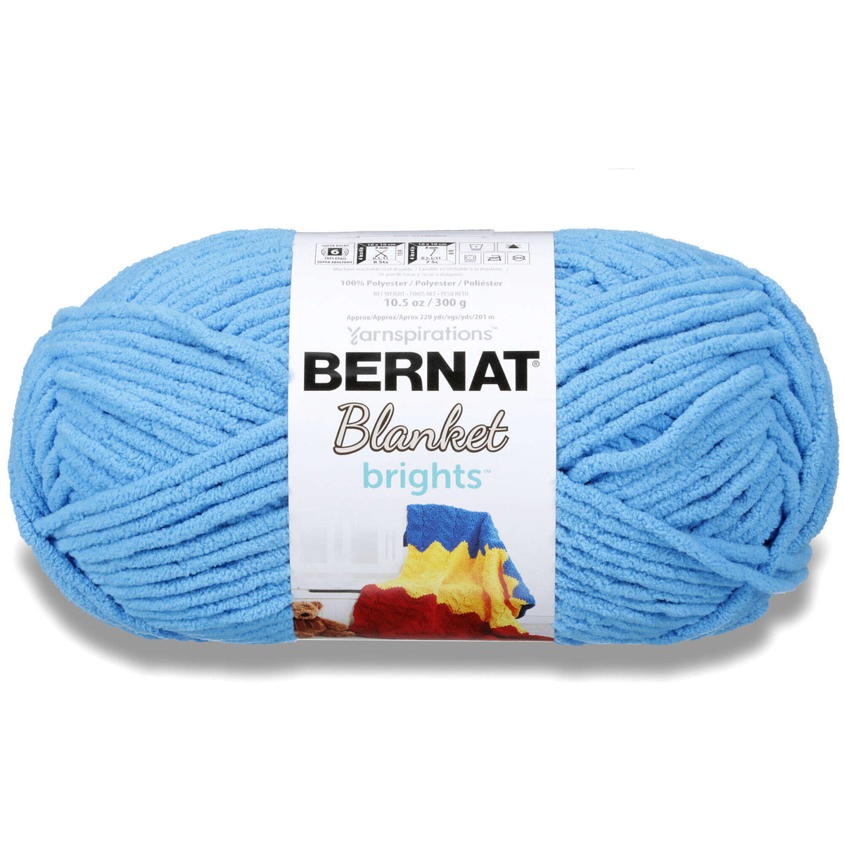 Blue skein of Bernat Blanket yarn with label on a white background