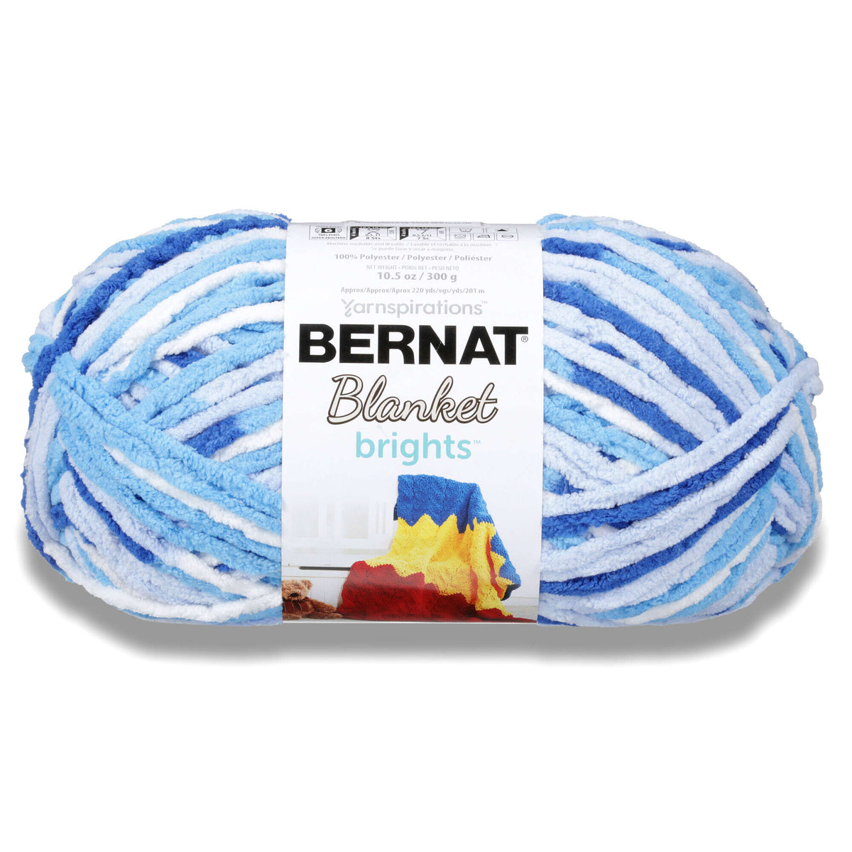 Ball of Bernat Blanket yarn with blue and white pattern on a white background