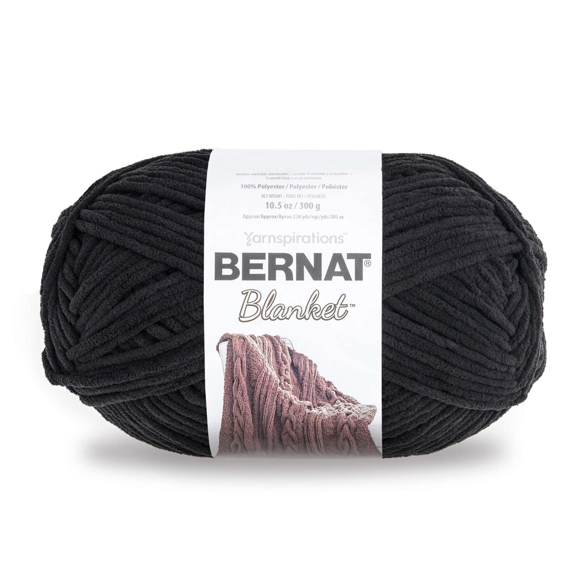 Black ball of Bernat Blanket yarn on a white background
