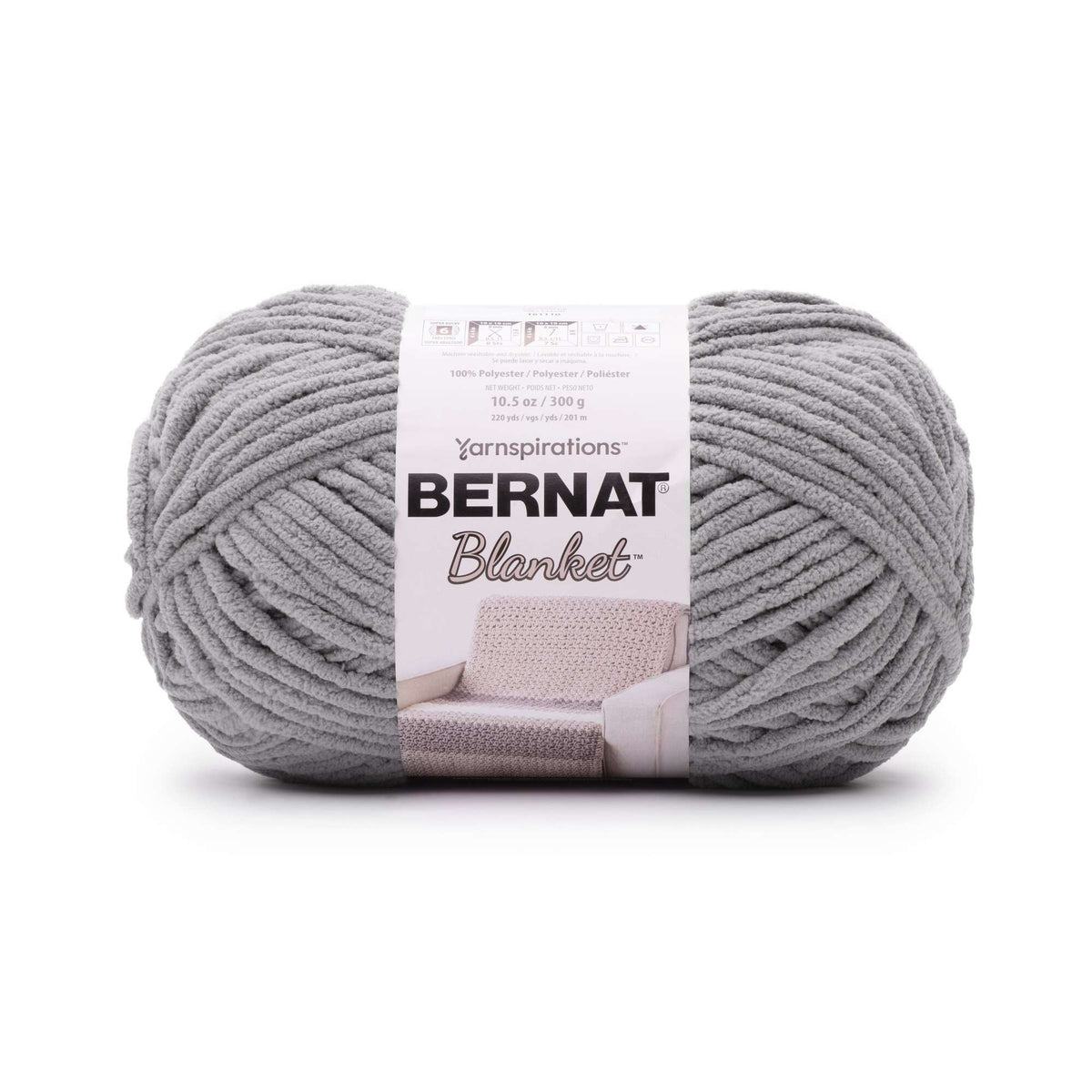 Gray ball of Bernat Blanket yarn with label on a white background