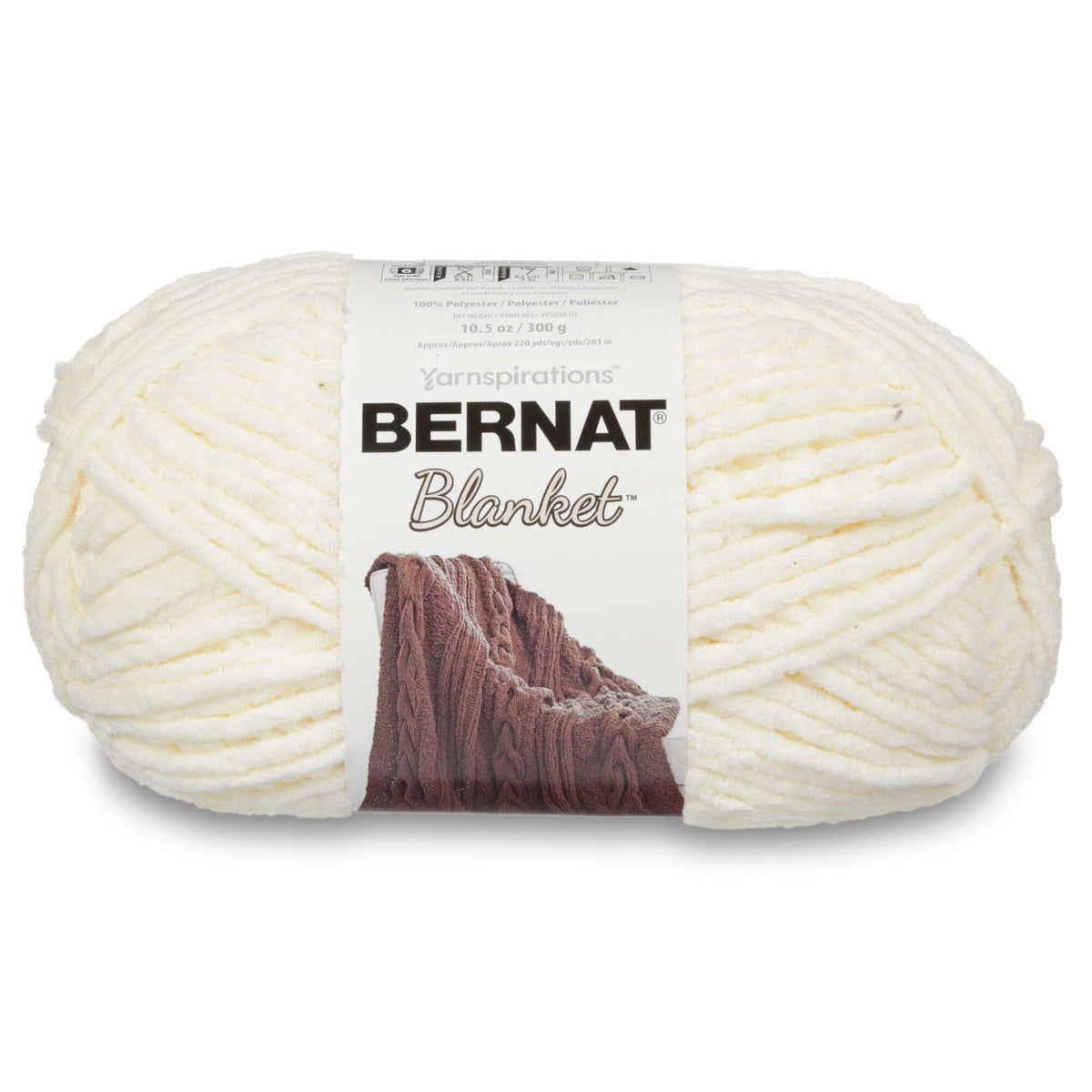 Ball of white Bernat Blanket yarn with label on a white background
