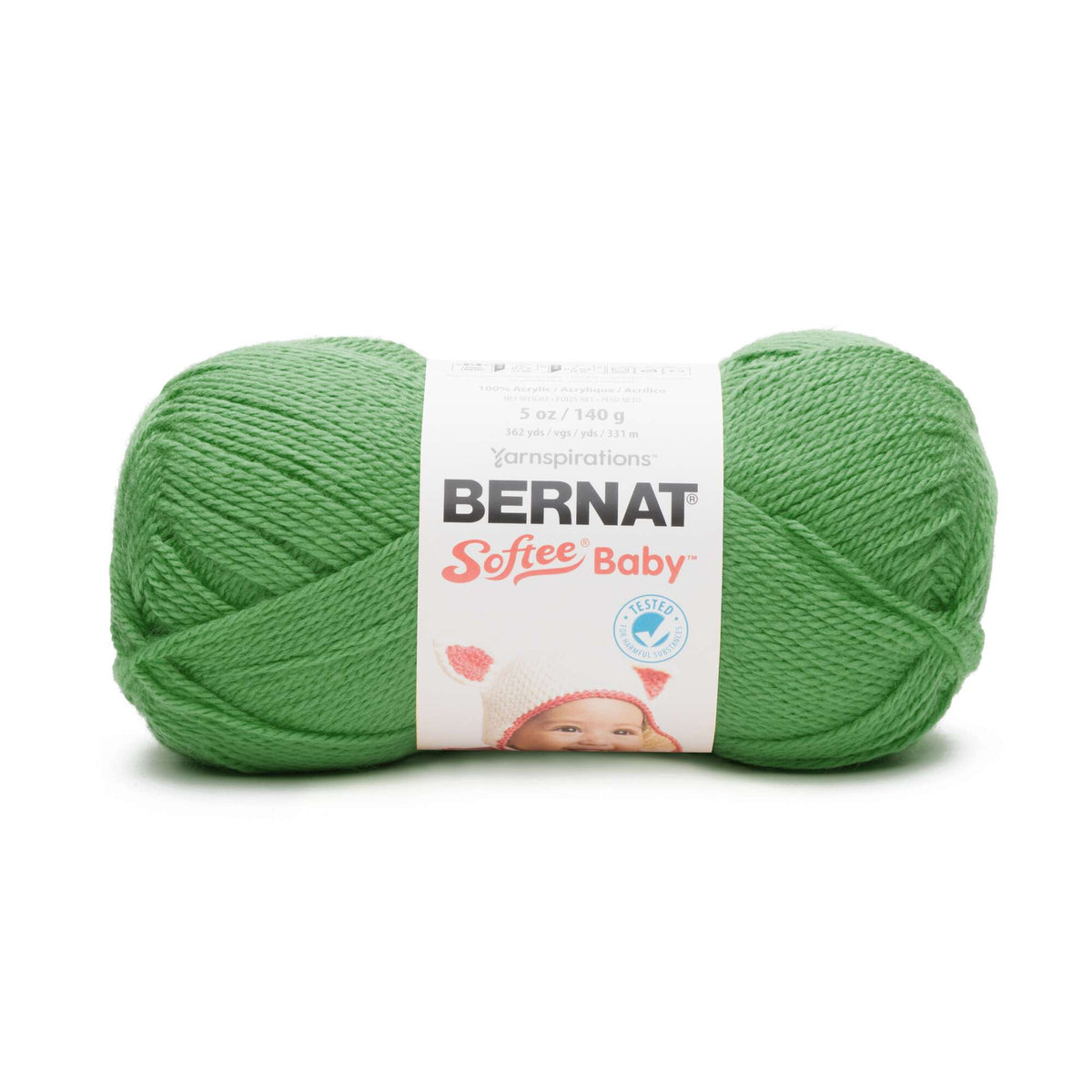 Green skein of Bernat Softee Baby yarn on a white background